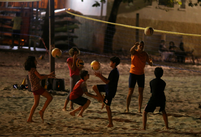 Children practice volleyball in Rio de Janeiro.